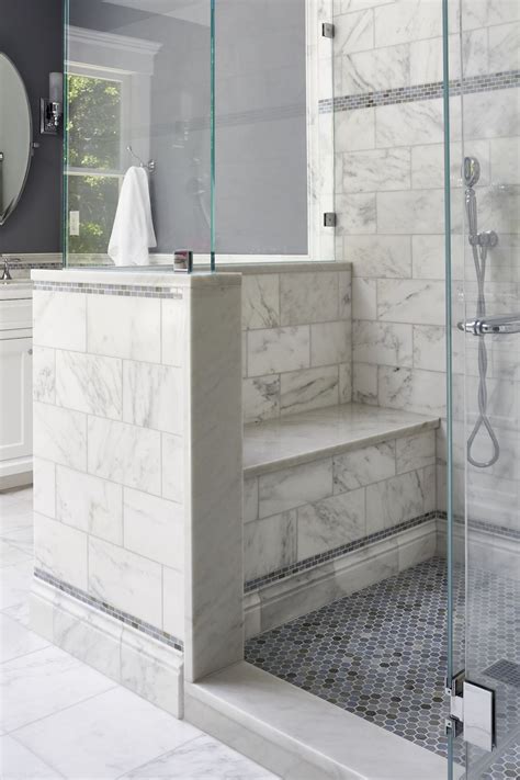 Built In Shower Bench In Master Bathroom Using White Carrara Marble