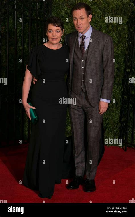 Actors From Left Olivia Colman And Tobias Menzies Pose For Photographers Upon Arrival At The