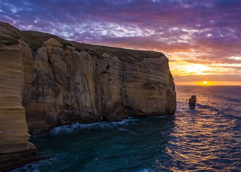Destination Of The Day Sunrise At Tunnel Beach New Zealand 2100x1500