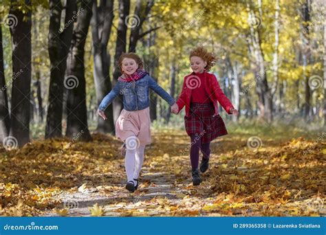 Happy Children Play In The Autumn Park Stock Photo Image Of Happy