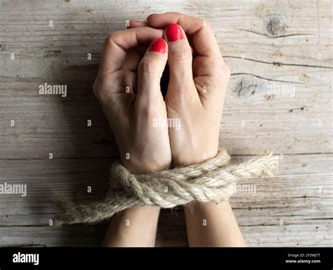 Hand Tied Rope Woman High Resolution Stock Photography And Images Alamy