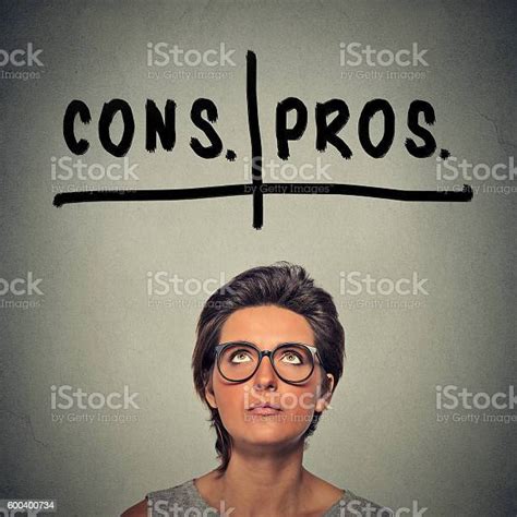 Pros And Cons Argument Woman Deciding Stock Photo Download Image Now