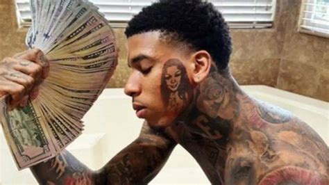 Nle Choppas Face Tattoo Of Chrisean Rock Sparks Backlash Us Buzz