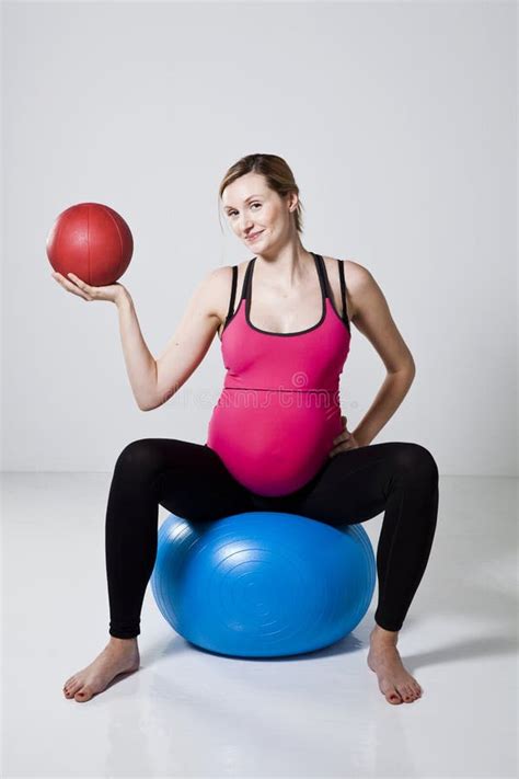 Pregnant Woman Exercising With Exercise Ball Stock Photo Image Of