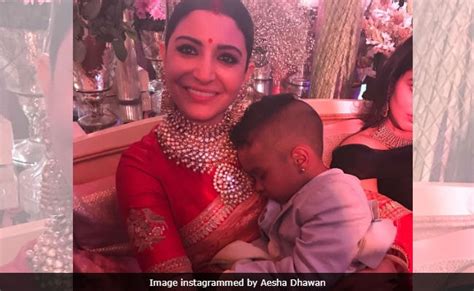 Seen This Pic Of Anushka Sharma Minding Shikhar Dhawans Son At Reception