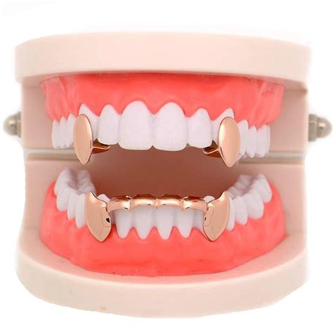Work for certain people i think i think it works for everybody i don't know. Lureen 14k Gold Vampire Dracula Teeth Grills 2pc Single ...