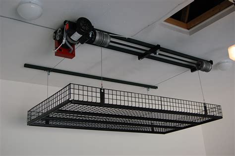 The ceiling isn't a place you usually think of when considering storage improvement ideas. Storage Ideas - Unique Lift | Garage ceiling storage ...