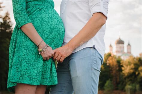 Pregnant Woman And Her Husband In Green Dress Stock Image Image Of Medicine Beautiful 65338009