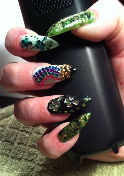 The greens and golds of this holiday's colors look fantastic on any. St. Patricks Day stiletto nails done by "Nail Candy" by ...