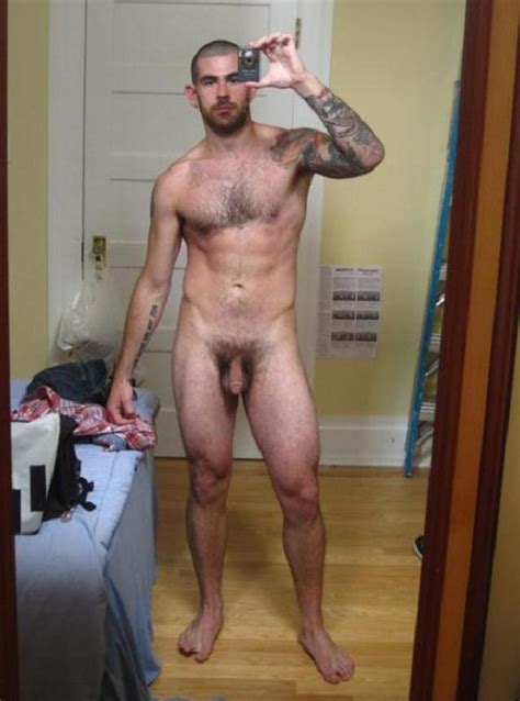 Hairy Nude Tattooed Man With Soft Cock