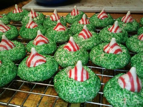My soft and sweet sugar cookie with a twist of red and topped with a chocolate hershey kiss!!! Christmas Hershey Candy Cane Kisses Cookies - found recipe ...