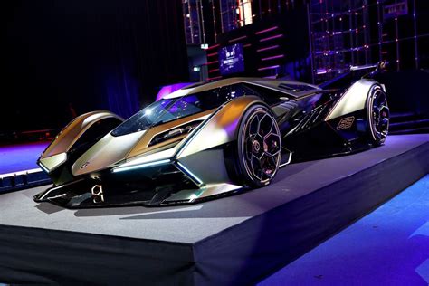 A Futuristic Car Is On Display At An Event