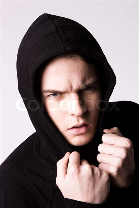 A Teenage Boy Wearing A Black Hoodie Stock Image Colourbox
