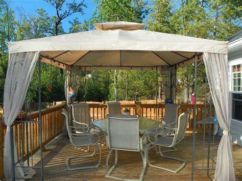 Four weight bags attach to the canopy legs using hook and loop straps and hold 25 lbs. Outdoor Canopy With Sides & Metal Framed Folding Gazebo ...