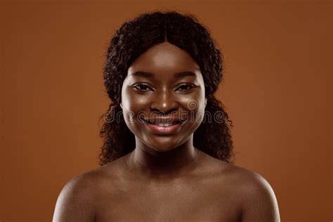 Portrait Of Attractive Naked African Woman With Beautiful Smile On