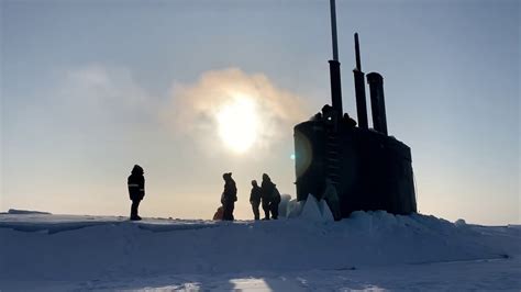 U S Navy Nuclear Submarine Uss Toledo Smashes Its Way Through Thick Ice Youtube