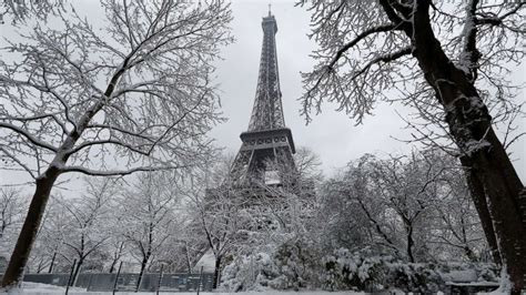 Heavy Snow Shuts Down Eiffel Tower Weeks After Abnormal Rainfall Soaked