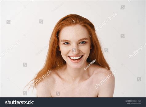 2219 Portrait Of Beautiful Natural Redhead Girl Smiling Hand On Eye