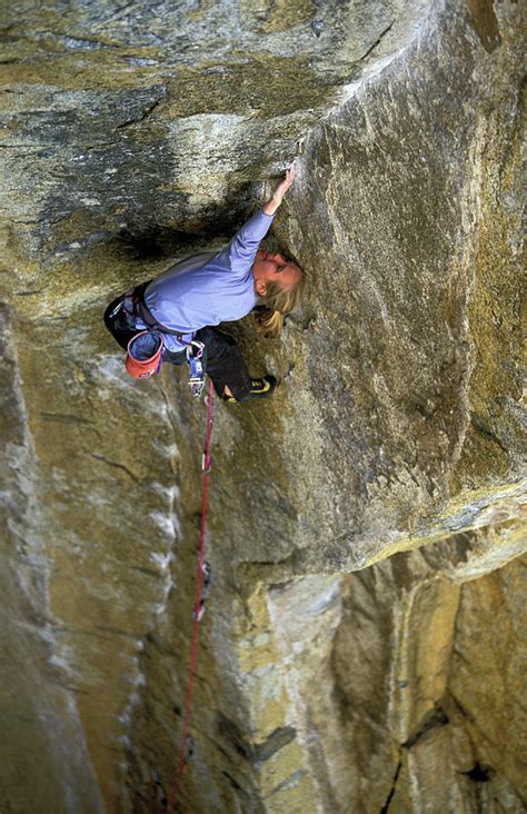 A Female Rock Climber Lead Climbing Photograph By Corey Rich Pixels