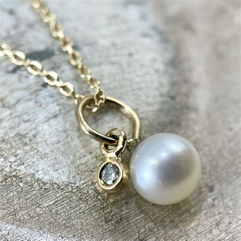 Pearl And Diamond Pendant Necklace