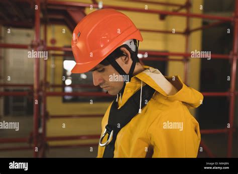 Male Worker Wearing Hard Hat At Solar Station Stock Photo Alamy