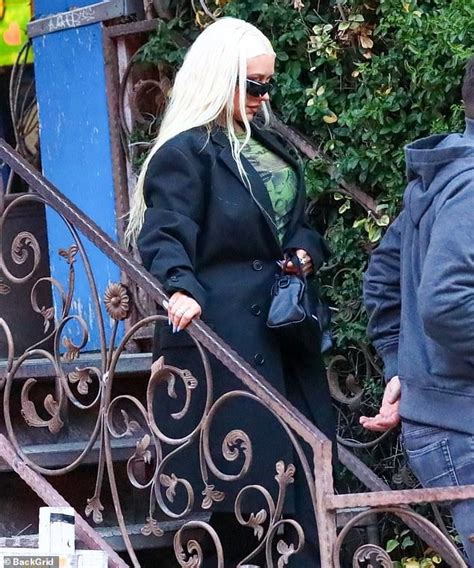 Christina Aguilera Stuns In A Black Pantsuit As She And Partner Matthew