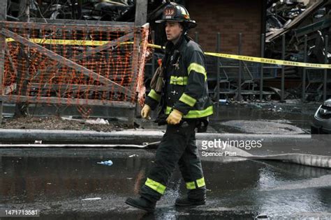 Fdny Firefighter Photos And Premium High Res Pictures Getty Images