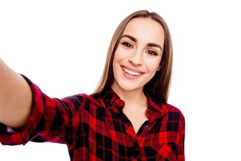 Premium Photo Attractive Young Woman With Beaming Smile Making Selfie
