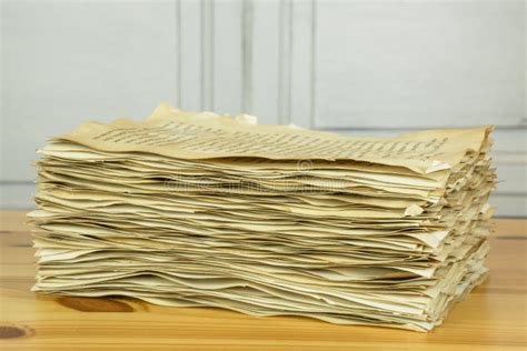 Stack Of Old Paper Sheets On Wooden Table Stock Photo Image Of