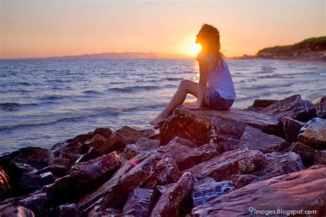 Sad Alone Girl Sea Side On Stones Sunset