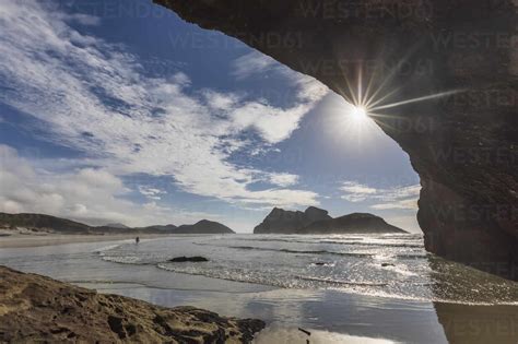New Zealand South Island Tasman Cave On Wharariki Beach Stock Photo