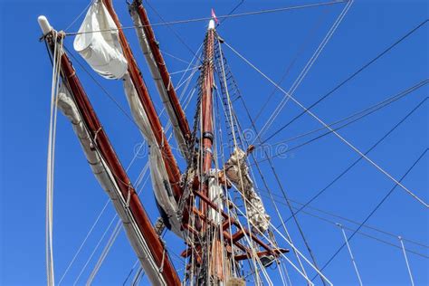 Sailing Ship Mast Against The Blue Sky On Some Sailing Boats With