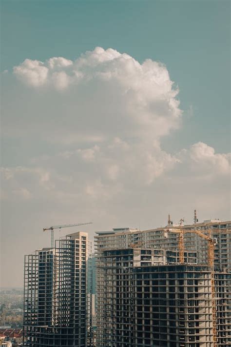 Cloud Over Buildings Construction In City · Free Stock Photo