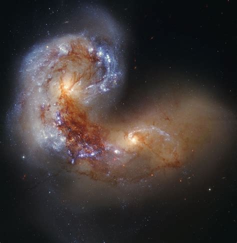 Two Spiral Galaxies Colliding