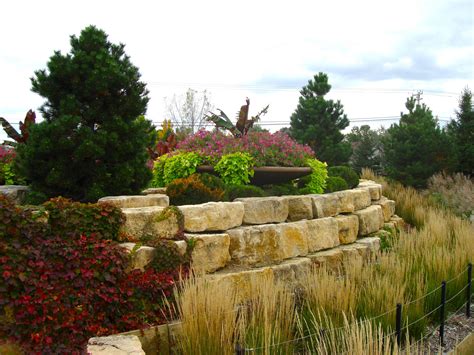 Boulder retaining wall design ideas are impressive with the raw beauty of the stones and the feeling of strength and sturdiness. Boulder Retaining Walls - Boulder Images Inc.