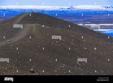 Hikers At Hverfell Also Called Hverfjall Tephra Cone Or Tuff Ring