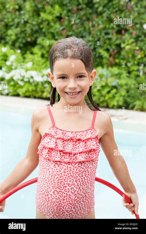 Little Girl Playing In Pool Portrait Stock Photo Alamy