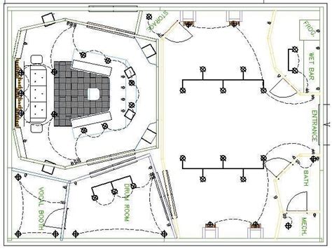 The Plan For An Indoor Basketball Court With Seating Areas And Other