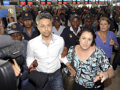 shrien dewani british businessman faced with chaotic scenes as he leaves cape town after being
