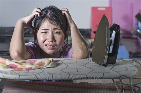 Portrait Of Young Pretty Frustrated And Stressed Asian Chinese Woman