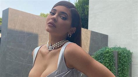 kylie jenner s sexy silver crop top is the only thing you need to spruce up your date night look