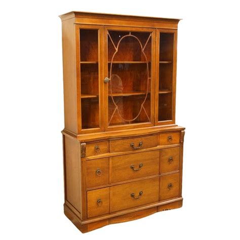 Maybe you would like to learn more about one of these? 1940's Vintage Walnut Duncan Phyfe China Cabinet | Chairish