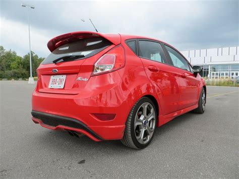 This allows all four wheels to move up and down independently, providing a smoother ride when, for example, going over bumps in the ford fiesta st (2014). Track-Driven: 2014 Ford Fiesta ST | Autobytel.com