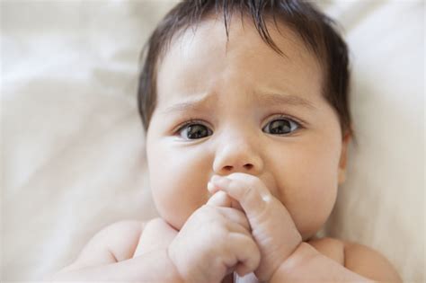 Fussy Baby Girl Sucking Her Thumb Stock Photo Download Image Now