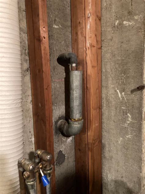 Found This Cast Iron Pipe Behind Drywall In Laundrybathroom That Copper Pipe Comes From The