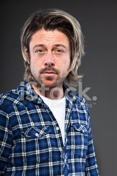 Expressive Young Man With Blond Long Hair And Beard Stock Photo