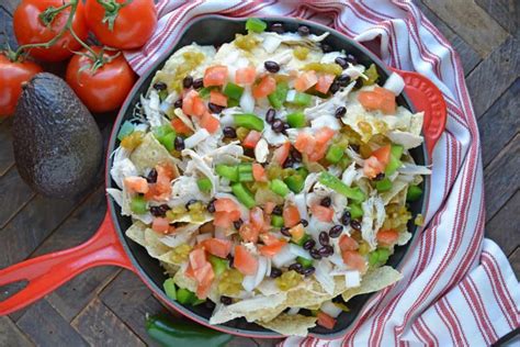 Loaded Chicken Nachos Are The Ultimate Nacho Recipe Topped With