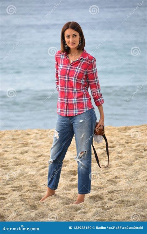 Beautiful Russian Woman Stands On The Beach Stock Photo Image Of