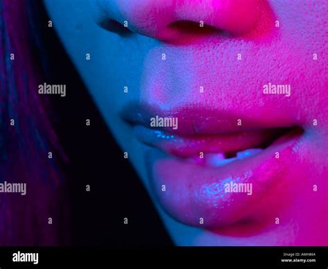 Oriental Woman Licking Lips Stock Photo Alamy