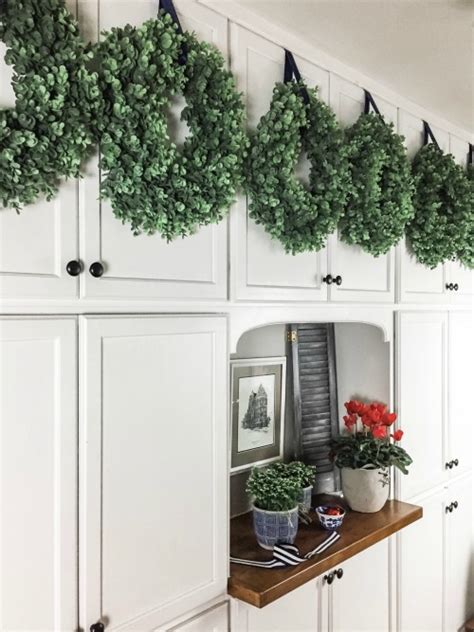 This old house general contractor tom silva shares expert tips and techniques for installing new kitchen cabinets kitchen cabinet install in this video, tom silva demostrates his preferred cabinet installation method. How to Hang Wreaths on Cabinet Doors | The Creek Line House
